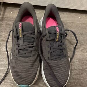 Nike Revolution Women's Black and Pink Athletic Shoes